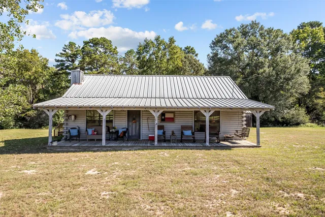 front view of a house with a patio