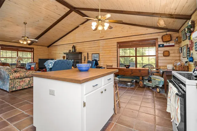 a view of living room with furniture and flat screen tv