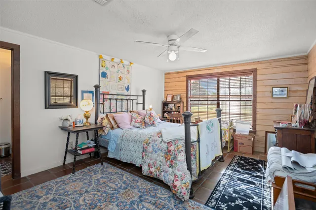 a bed room with furniture and a window
