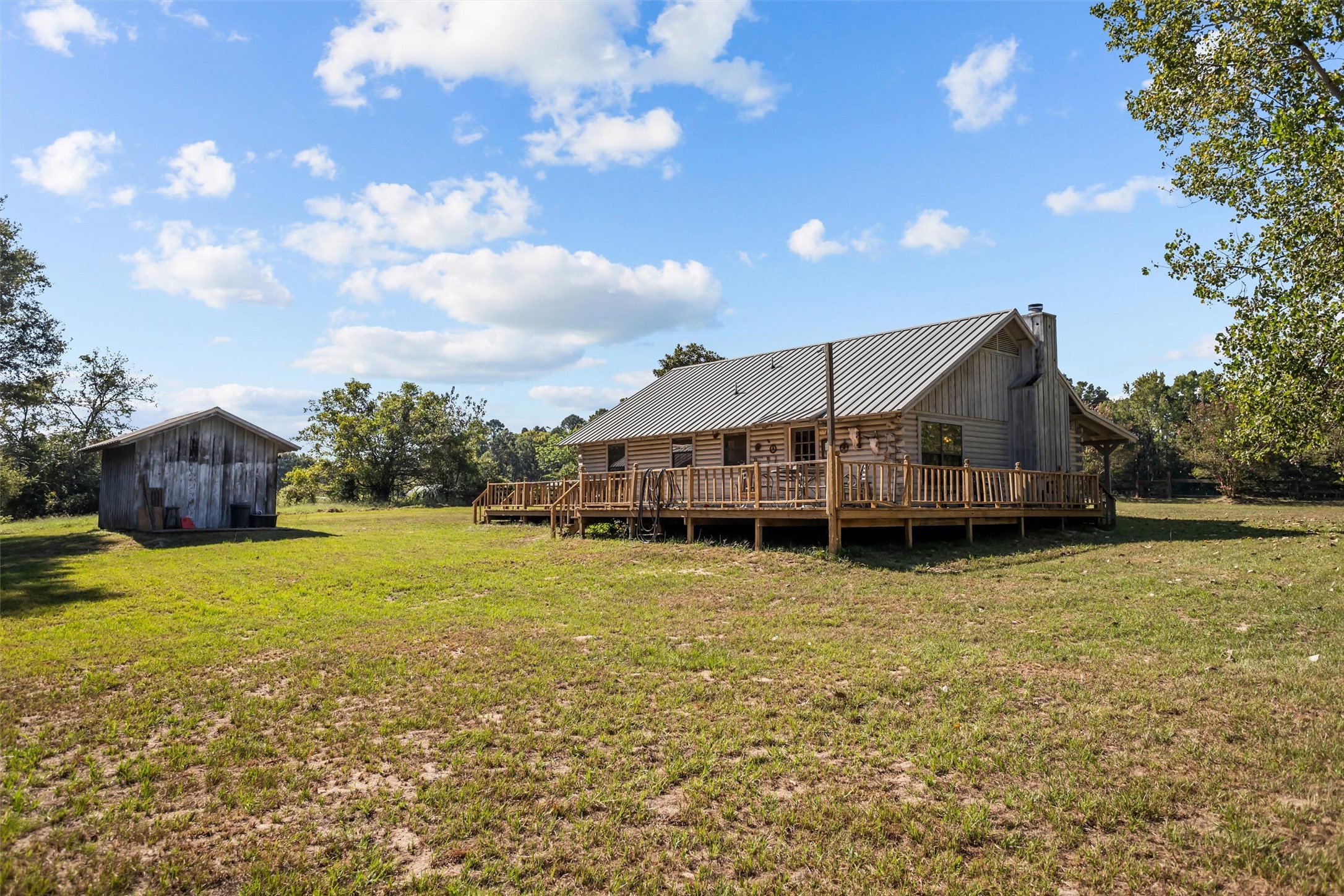 120 Fsr 513 Kennard, TX 75847 - Photo 23 of 47 a house view with a garden space