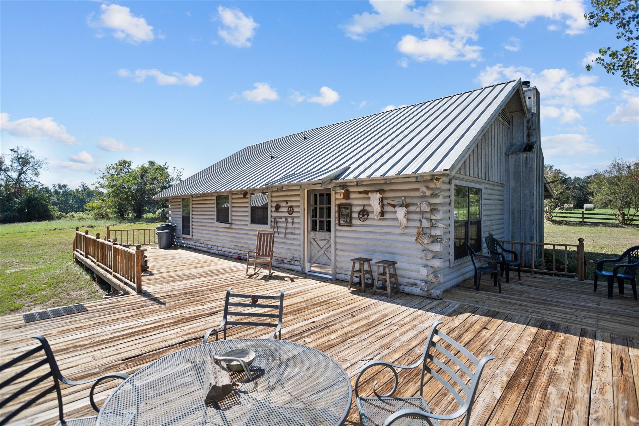 120 Fsr 513 Kennard, TX 75847 - Photo 6 of 47 a view of a house with backyard and sitting area