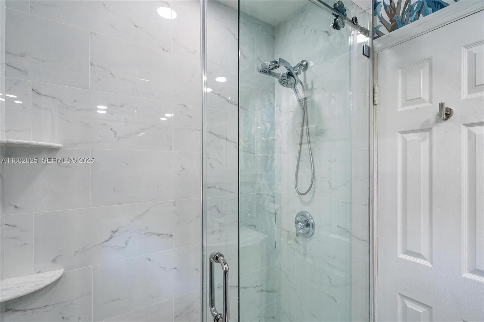 9357 Northeast 9th Place Miami Shores, FL 33138 - Photo 25 of 51 a bathroom with a shower