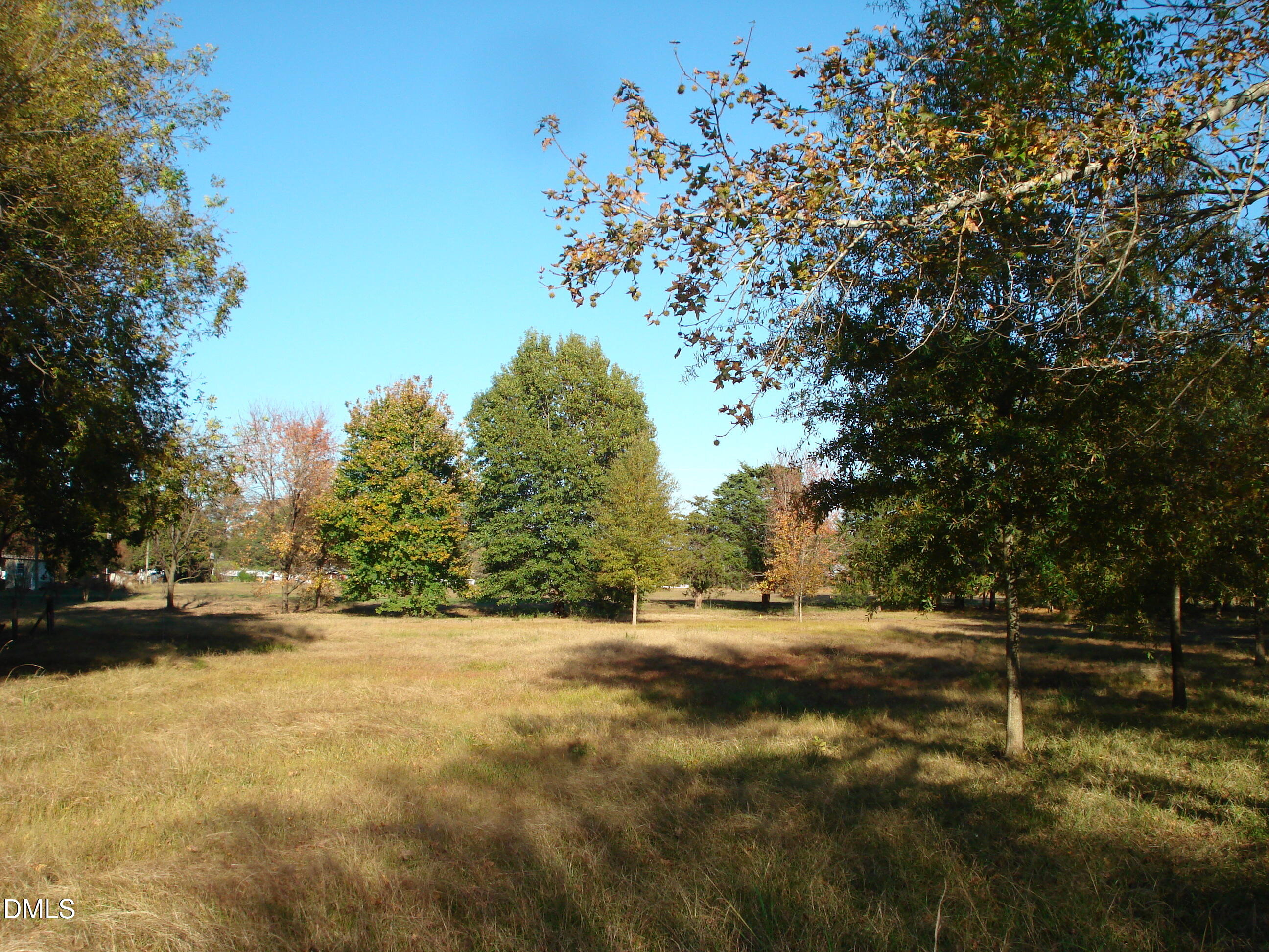 0 Bait Road Dunn, NC 28334 - Photo 11 of 33 a view of outdoor space with trees all around