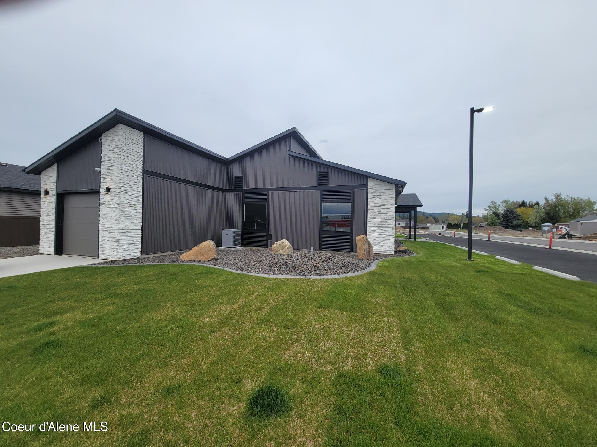 13916 Rainier Loop Rathdrum, ID 83858 - Photo 44 of 57 Clubhouse garage side