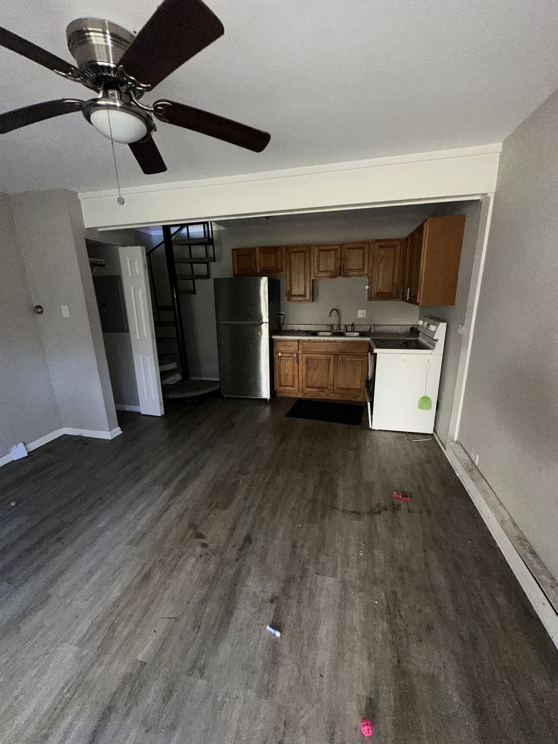 16 St Thomas Colony Street, Unit 6 Fox Lake, IL 60020 - Photo 2 of 10 a view of entryway and hall with wooden floor