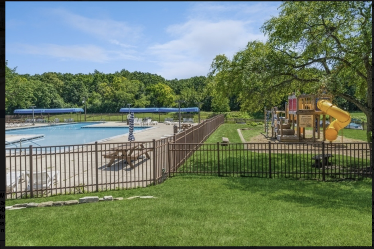 16 St Thomas Colony Street, Unit 6 Fox Lake, IL 60020 - Photo 8 of 10 a view of a wrought iron deck with a garden