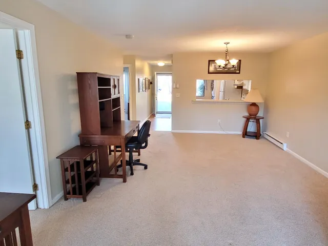 a view of a livingroom with furniture