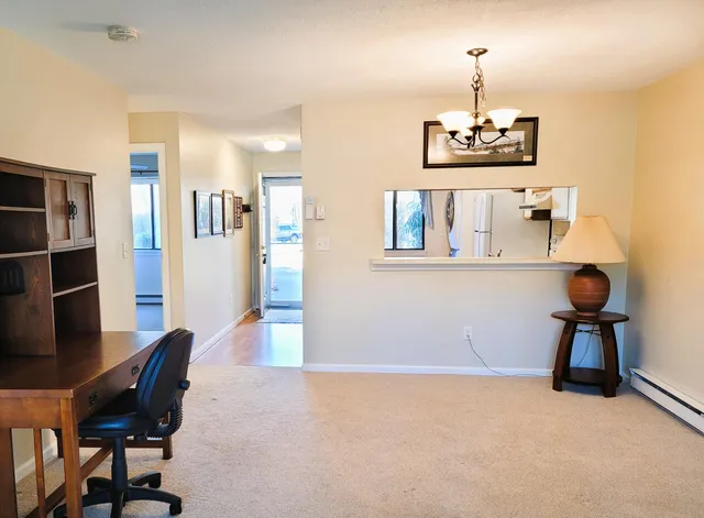a view of a dining room with furniture