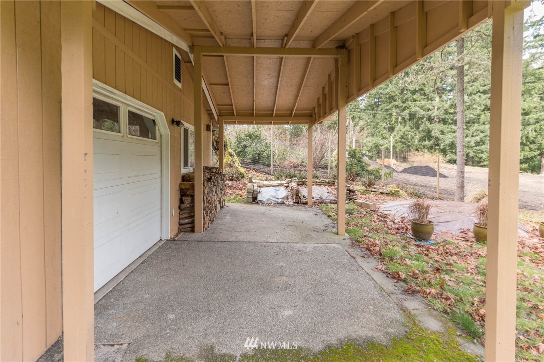 18109 Thorsen Road Southwest Vashon, WA 98070 - Photo 25 of 37 a view of a porch