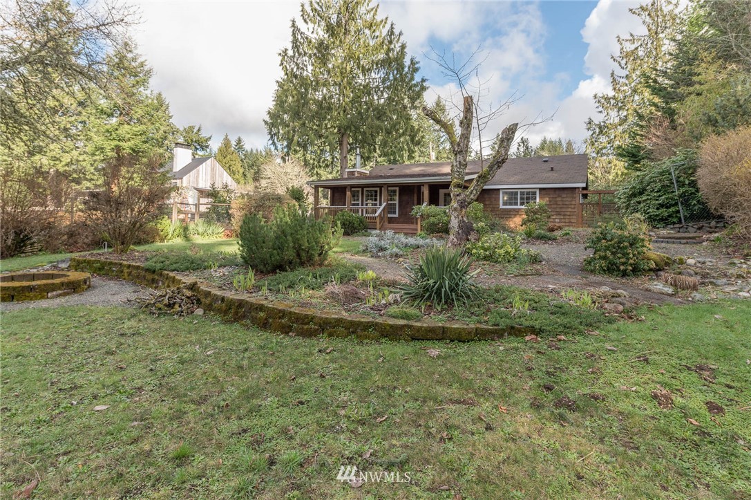 18109 Thorsen Road Southwest Vashon, WA 98070 - Photo 28 of 37 a view of a house with a garden