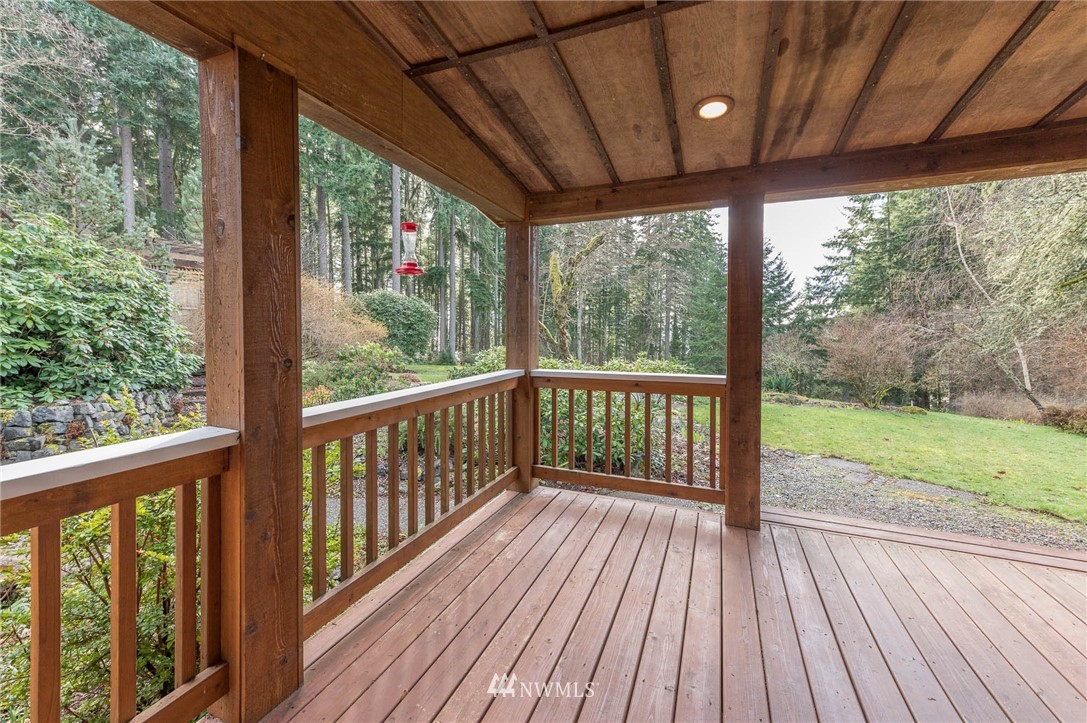 18109 Thorsen Road Southwest Vashon, WA 98070 - Photo 31 of 37 a view of a room with wooden floor and outdoor space