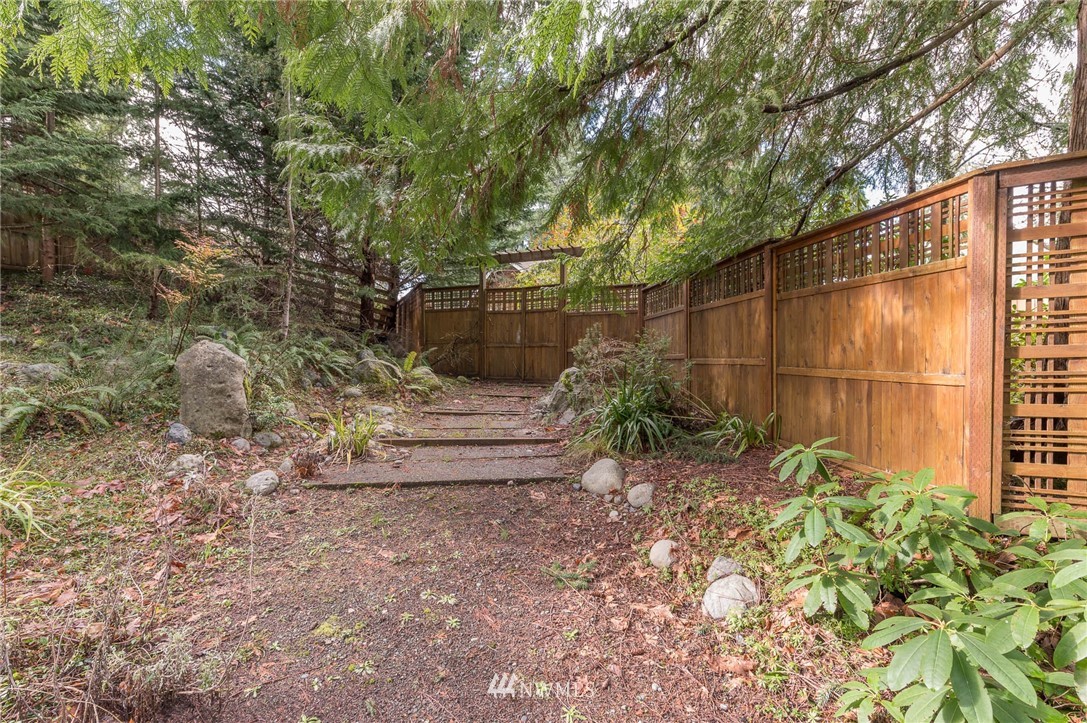 18109 Thorsen Road Southwest Vashon, WA 98070 - Photo 8 of 37 a view of a backyard