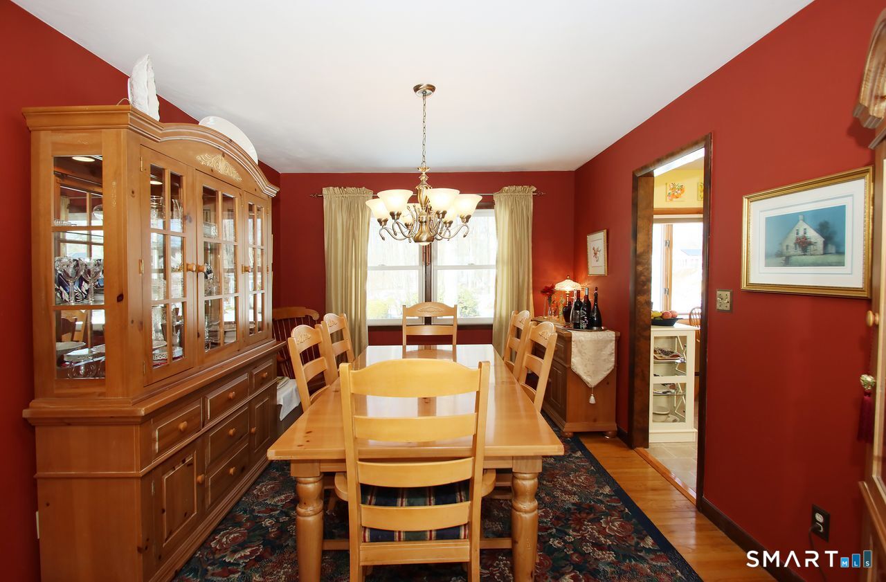 7 Old Forge Road North Haven, CT 06473 - Photo 14 of 40 a very nice looking room with many windows and furniture