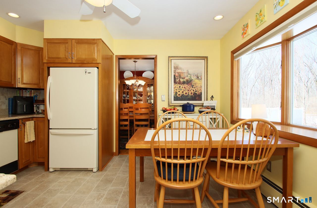 7 Old Forge Road North Haven, CT 06473 - Photo 20 of 40 a view of a dining room with furniture window and outside view