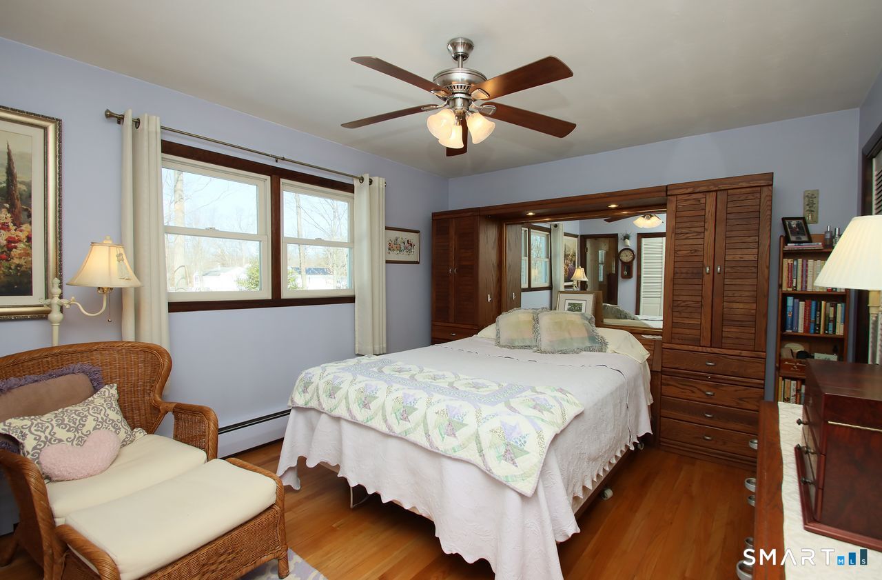 7 Old Forge Road North Haven, CT 06473 - Photo 24 of 40 a bedroom with a bed and window