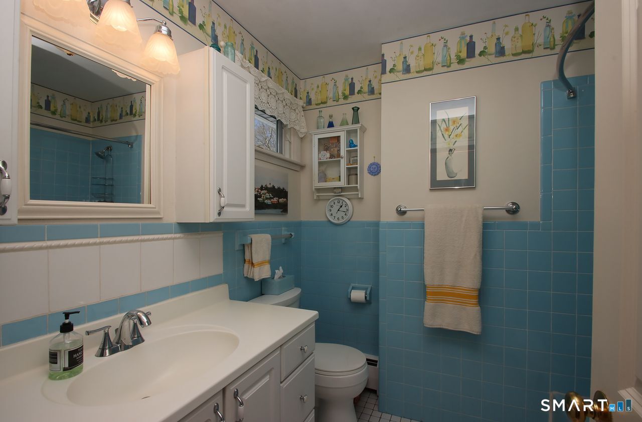 7 Old Forge Road North Haven, CT 06473 - Photo 28 of 40 a bathroom with a sink toilet and shower