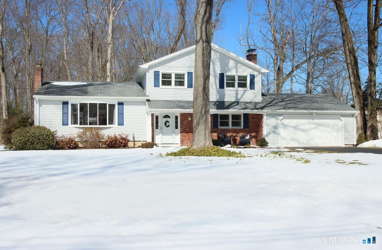 7 Old Forge Road North Haven, CT 06473 - Photo 3 of 40 front view of a house with a yard