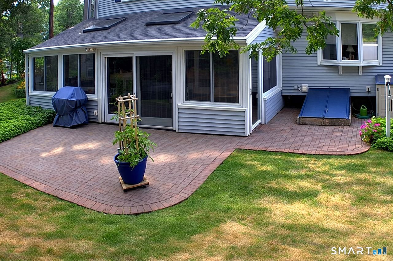 7 Old Forge Road North Haven, CT 06473 - Photo 36 of 40 a front view of a house with garden