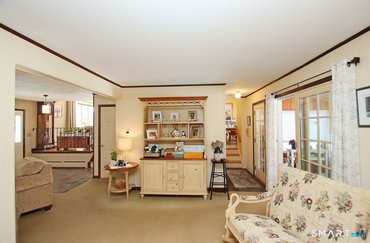 7 Old Forge Road North Haven, CT 06473 - Photo 7 of 40 a view of a bedroom with furniture and windows