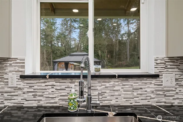 a view of house with a window and wooden floor