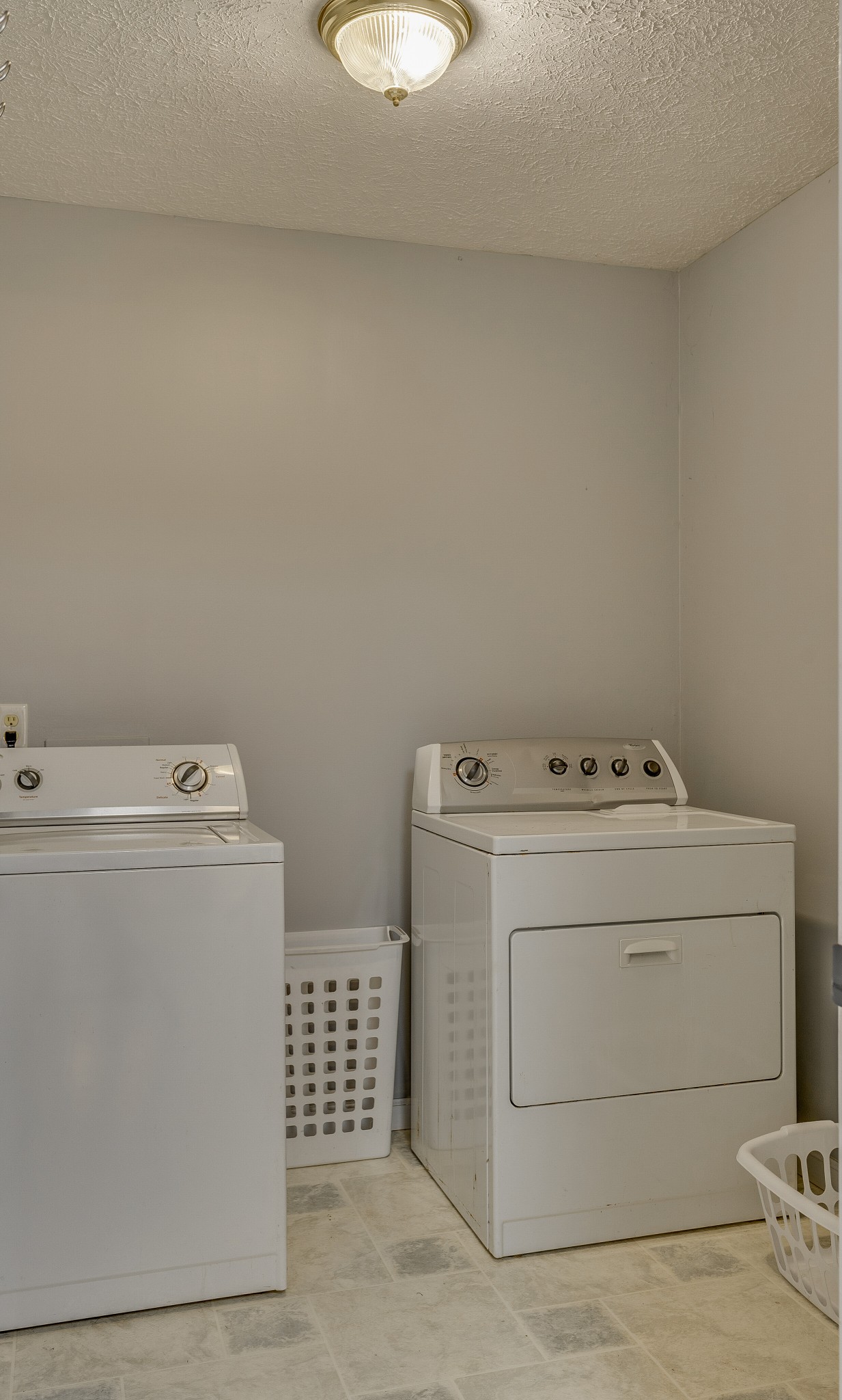 140 Cora Street Portland, TN 37148 - Photo 14 of 27 a utility room with dryer and washer