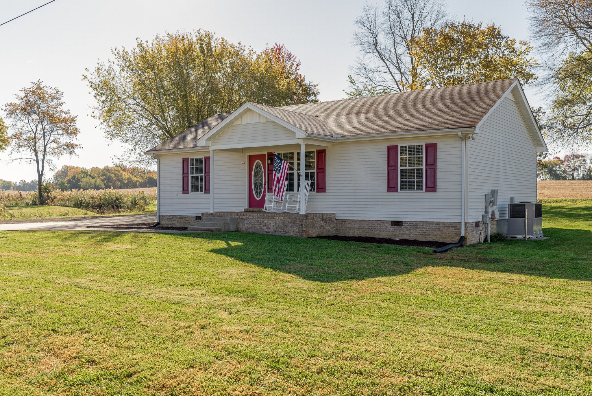 140 Cora Street Portland, TN 37148 - Photo 3 of 27 a front view of house with yard and swimming pool