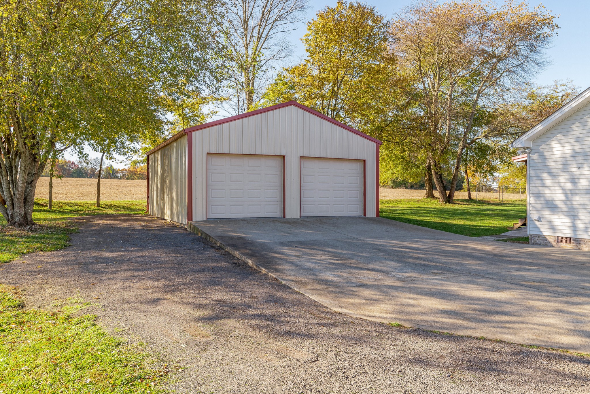 140 Cora Street Portland, TN 37148 - Photo 22 of 27 a view of a house with a yard and garage