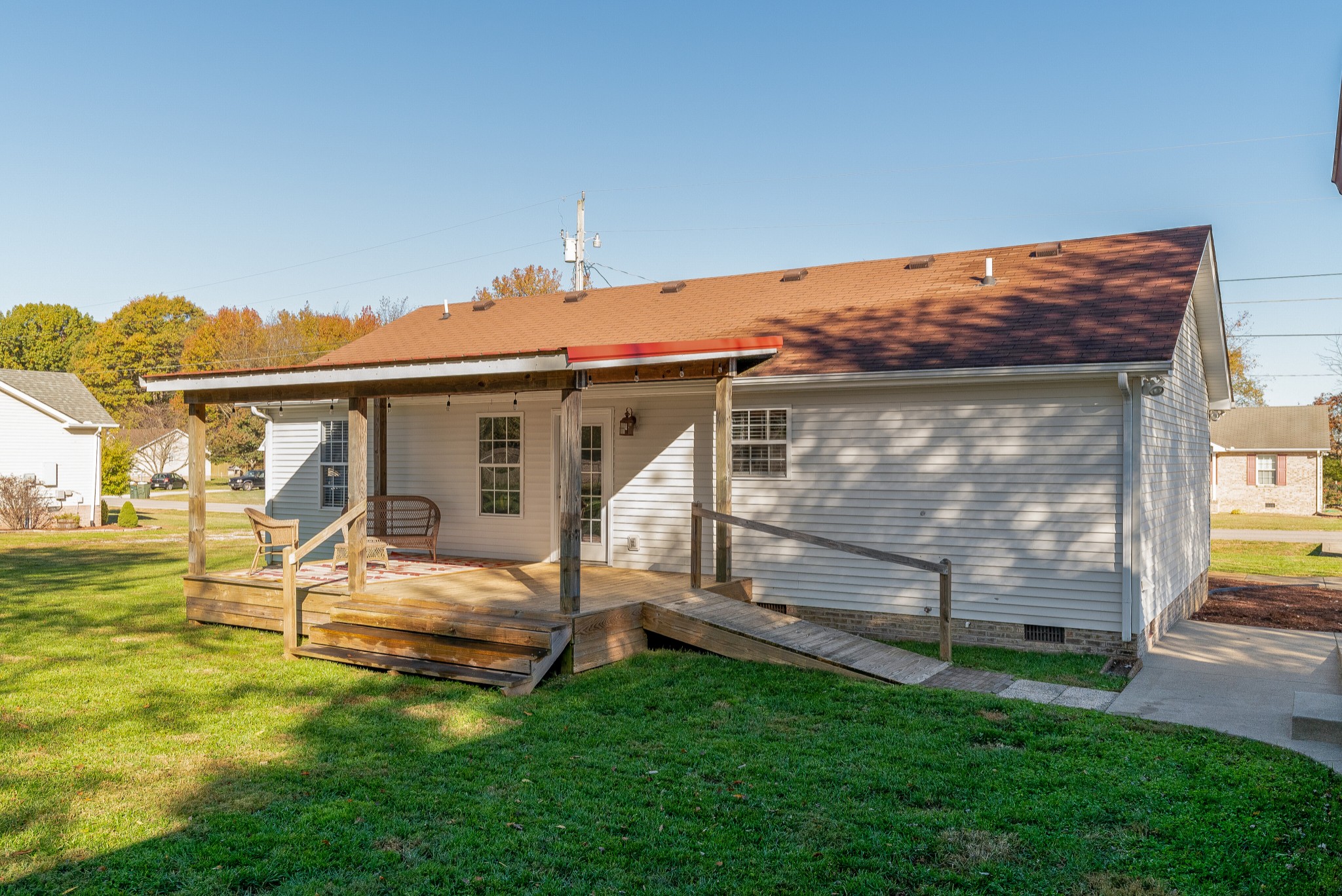 140 Cora Street Portland, TN 37148 - Photo 26 of 27 a view of a house with a backyard