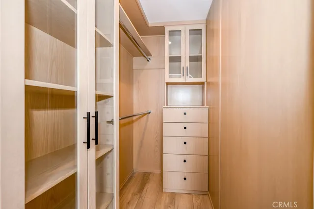 hallway view with wooden floor