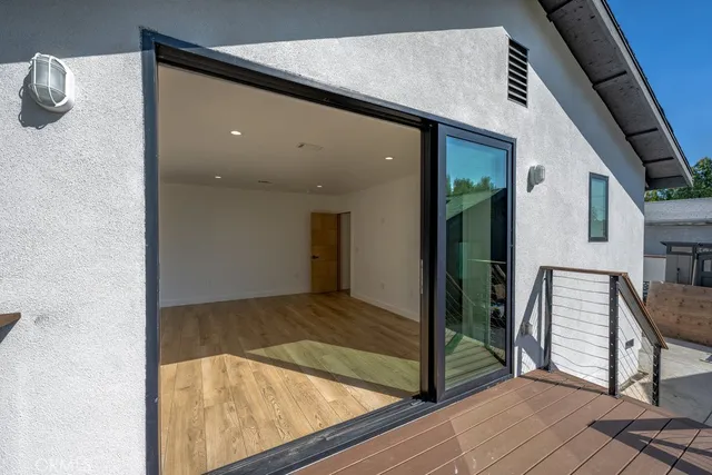 a view of balcony with furniture