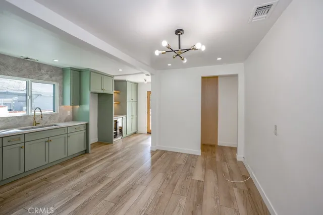 a view of a kitchen from the hallway