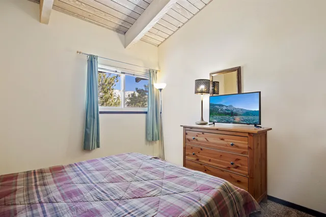 a bedroom with a bed and furniture