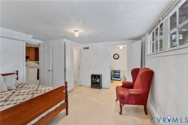 a bedroom with furniture and a couch