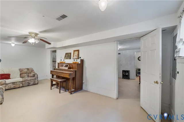 a room with furniture and a chandelier