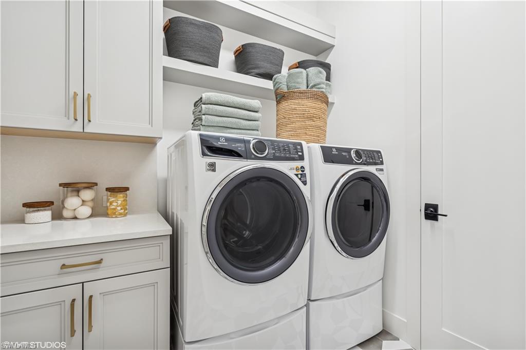 19080 Via Messina Way Miromar Lakes, FL 33913 - Photo 42 of 49 a utility room with dryer and washer