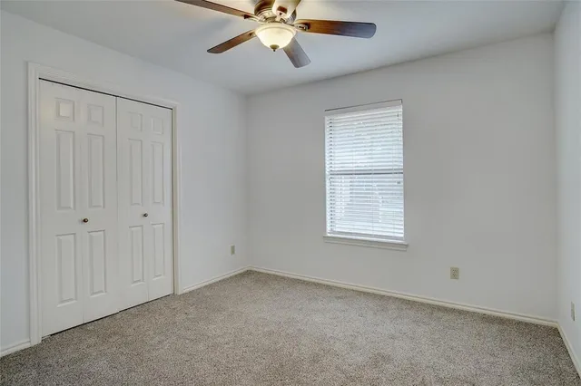 a dinning room with table and chairs