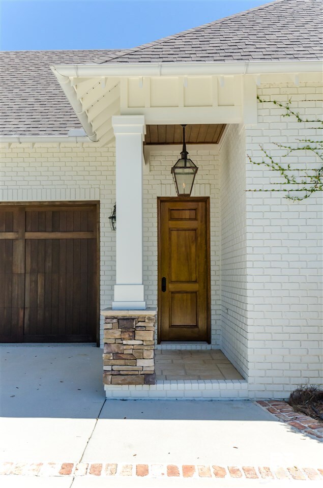 533 Falling Water Boulevard Fairhope, AL 36532 - Photo 39 of 50 8' Door, Wood Ceiling, Custom designed fixture
