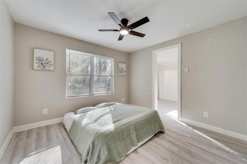 109 Lydia Street Terrell, TX 75160 - Photo 5 of 22 a bedroom with a bed and window