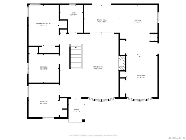 a living room with lots of furniture and a window