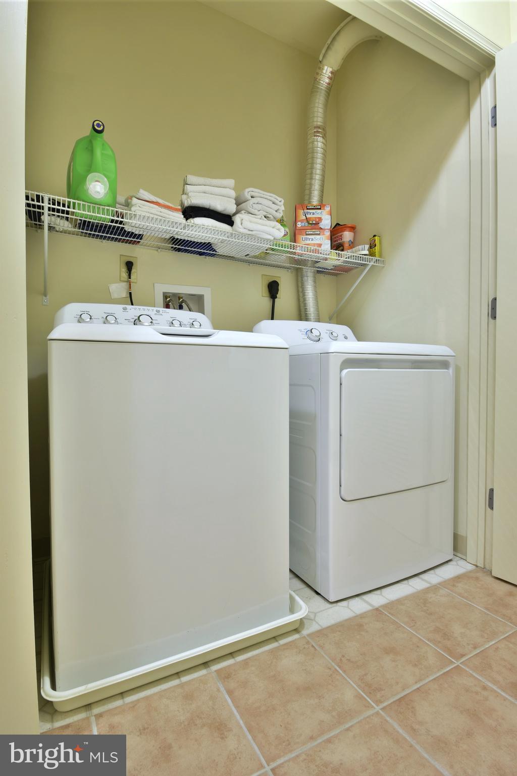 11770 Sunrise Valley Drive, Unit 120 Reston, VA 20191 - Photo 30 of 41 a utility room with dryer and washer