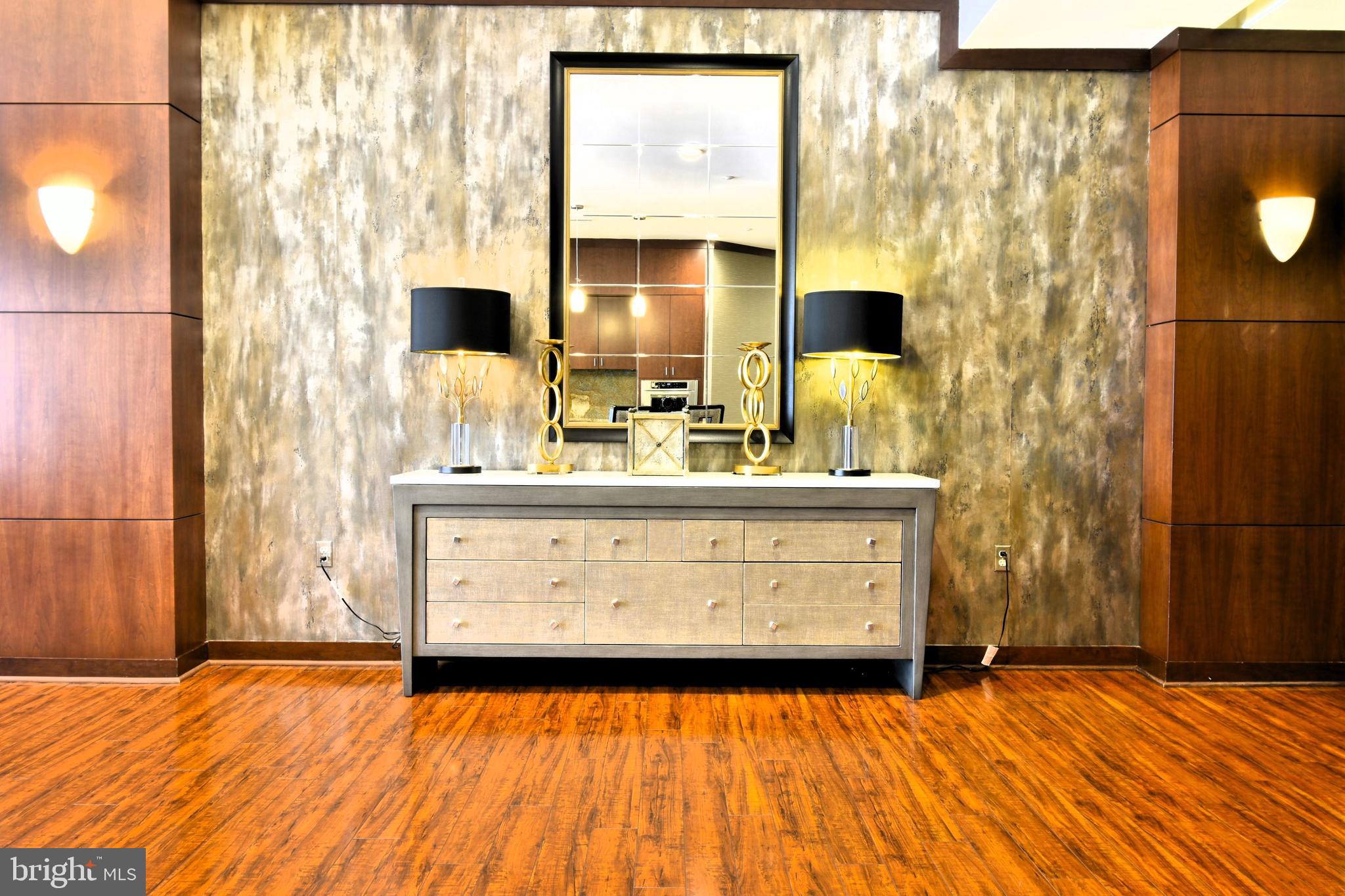 11770 Sunrise Valley Drive, Unit 120 Reston, VA 20191 - Photo 37 of 41 a bathroom with a sink double vanity and a mirror