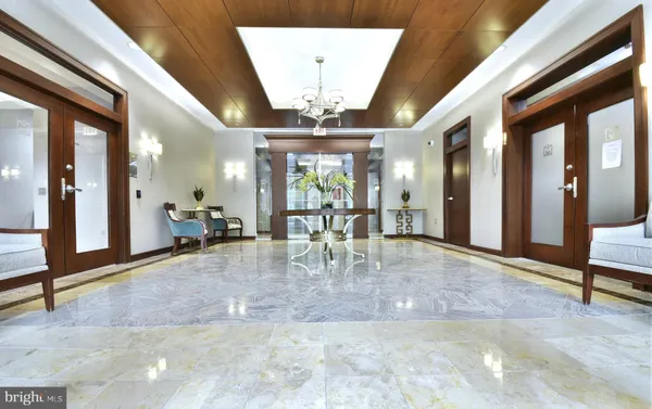 a view of a lobby with a chandelier