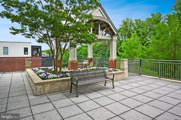 a view of a terrace with sitting area