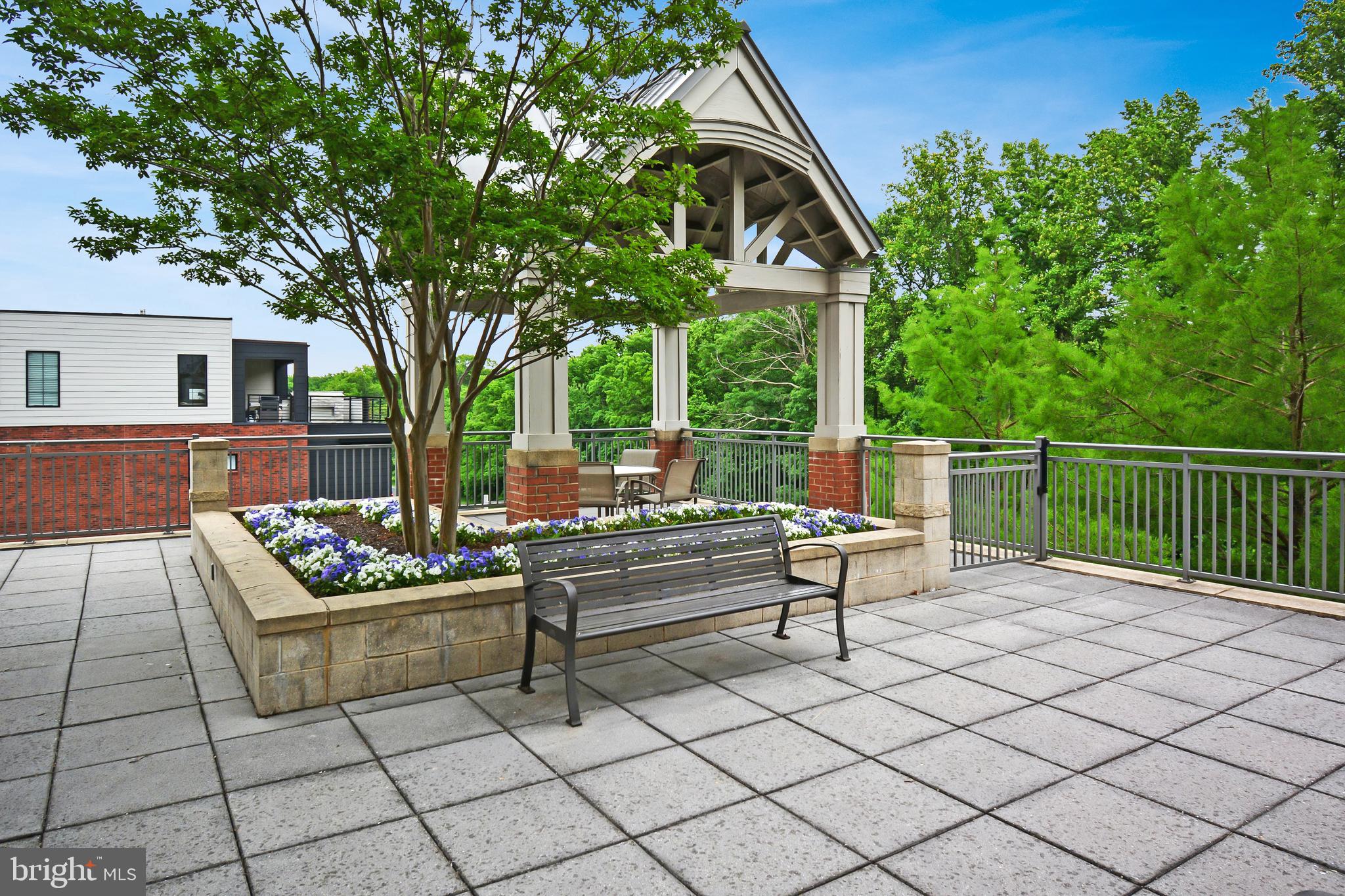 11770 Sunrise Valley Drive, Unit 120 Reston, VA 20191 - Photo 8 of 41 a view of a terrace with sitting area