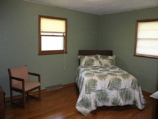 7175 Ralph Road Rockford, IL 61109 - Photo 5 of 11 a bedroom with a bed and a window