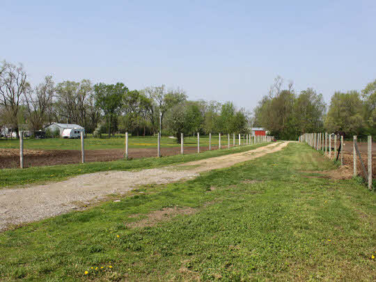 7175 Ralph Road Rockford, IL 61109 - Photo 9 of 11 a view of a park with large trees