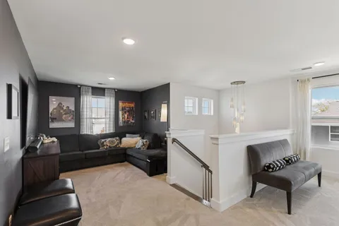 a view of furniture and potted in a room