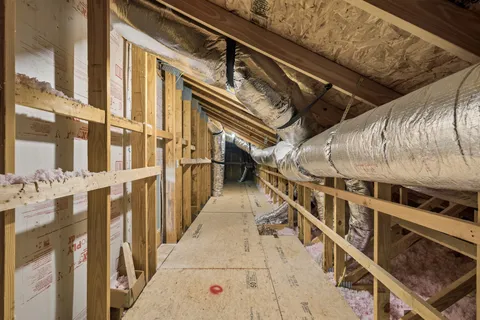 a view of a city with a tall building