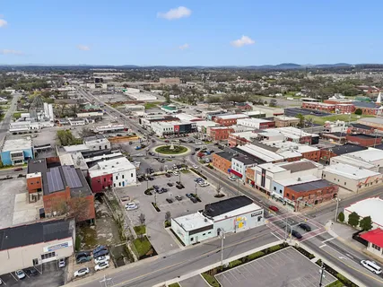 a view of a building with a street