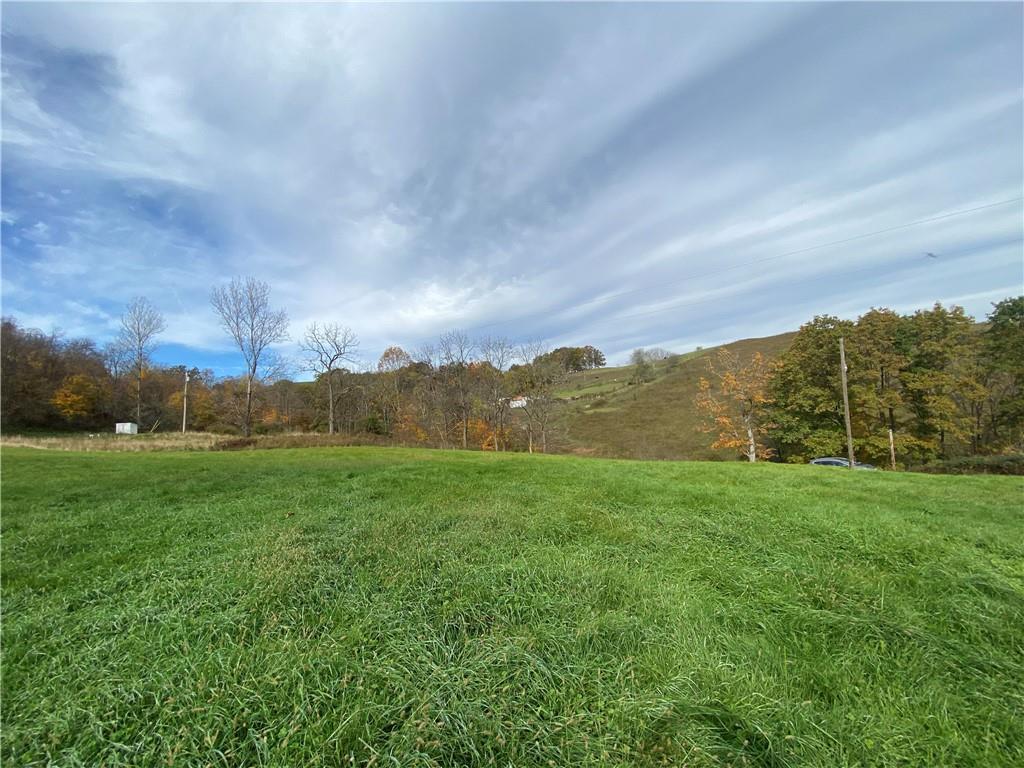 290 Calverts Hill Road Spraggs, PA 15362 - Photo 11 of 22 a view of a field with an ocean